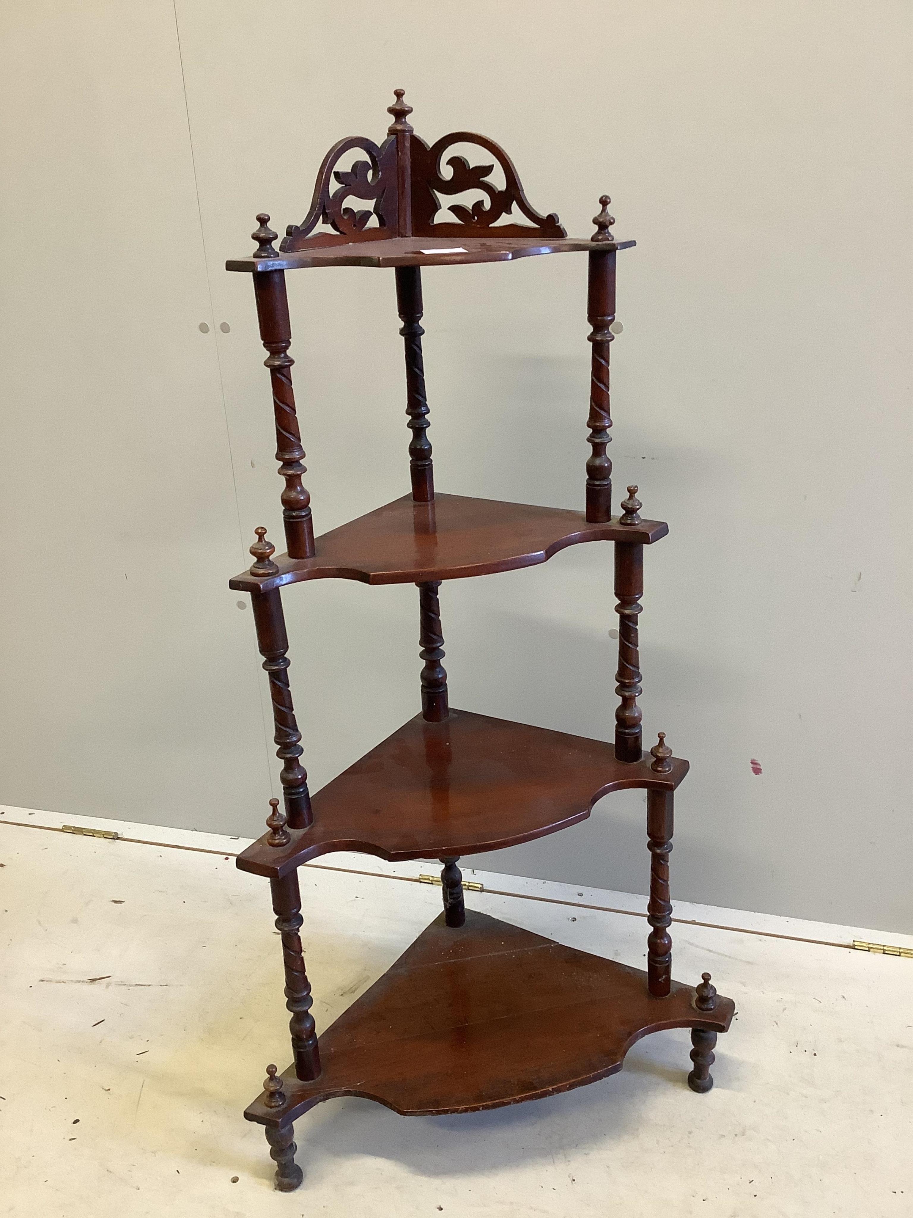 A Victorian mahogany four tier graduated corner whatnot, width 60cm, depth 35cm, height 116cm. Condition - fair